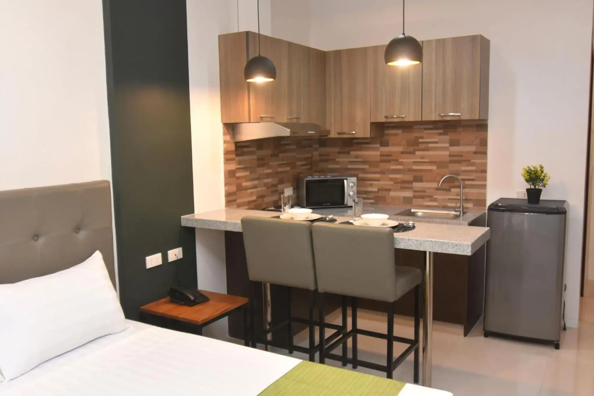 Bed in Andeo Suites